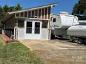 Property with RV, boat, and detached garage at 332 Mount View Ln, New London, NC 28127