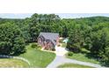 Brick house with pool and large yard at 5610 Golden Pond Dr, Indian Trail, NC 28079