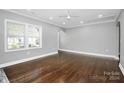 Living room with hardwood floors and large windows at 508 Northern St, Shelby, NC 28150