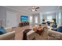 Open living room with hardwood floors and neutral decor at 3921 Sky Dr, Charlotte, NC 28226