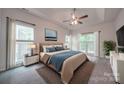 Main bedroom with ample light and neutral decor at 6232 Hickory Cove Ln, Charlotte, NC 28269