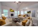 Spacious living room with a fireplace and ample natural light at 6232 Hickory Cove Ln, Charlotte, NC 28269