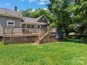Spacious deck overlooks fenced backyard with shed at 510 5Th St, Spencer, NC 28159