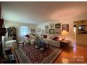 Bright living room with hardwood floors and ample seating at 506 Hearne Farm Rd, Mount Gilead, NC 27306