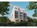Elegant 3-story building with balconies and a patio at 409 Queens Rd # 303, Charlotte, NC 28207