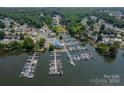 Aerial view of marina with numerous boats and docks at 108 Grand View Dr, New London, NC 28127