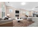 Spacious living room with fireplace, large windows and neutral decor at 4426 Pine St # 74, Kannapolis, NC 28081