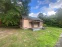 Older fixer-upper home with a porch and needs significant renovations at 303 Ray St, Lancaster, SC 29720
