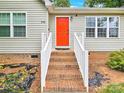 Steps leading to a red front door at 919 Edgemont Ave, Belmont, NC 28012