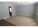 Spacious living room with new carpet and fresh paint at 410 Clinton Dr, Kings Mountain, NC 28086