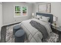 Cozy bedroom with plush bedding and window views at 138 Bufflehead Dr, Mooresville, NC 28117