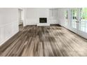 Spacious living room with hardwood floors and fireplace at 138 Bufflehead Dr, Mooresville, NC 28117