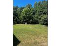 Large backyard with shed and wooded area at 655 Lippard Rd, Salisbury, NC 28146