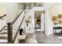 Bright entryway with staircase, storage, and view to living room at L4 Marietta Rd # 4, Mooresville, NC 28117