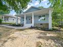 Newly renovated light blue house with front porch at 253 Franklin Nw Ave, Concord, NC 28025