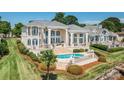 Luxury home with pool and lakefront access at 3446 Governors Island Dr, Denver, NC 28037