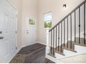 Bright entryway with hardwood floors and a view of the staircase at 2005 Germany Dr, Dallas, NC 28034