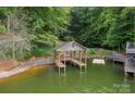Private boat slip with covered dock and waterfront access at 80 Fairview Farms Rd, Shelby, NC 28150