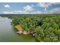 Lakefront property with lush green surroundings at 80 Fairview Farms Rd, Shelby, NC 28150