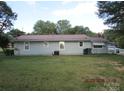 Rear view of house with access to a large backyard at 115 Sunrise Cir, Shelby, NC 28150