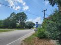 Roadside view with highway signs and some businesses at 407 Chester Ave, Great Falls, SC 29055