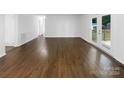 Spacious living area with hardwood floors and access to backyard at 1819 Danbury St, Gastonia, NC 28052