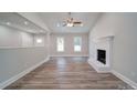 Bright living room with fireplace and hardwood floors at 526 Manchester Rd, Mount Gilead, NC 27306
