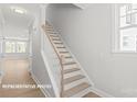 Bright, spacious staircase at 10607 Audubon Ridge Dr # 27, Cornelius, NC 28031