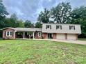 Brick ranch house with a two-car garage at 469 Radio Rd, Taylorsville, NC 28681