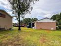 View of large barn and backyard with deck, pool, and gazebo at 1470 River Hills Ct, Taylorsville, NC 28681