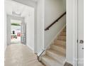 Bright and airy entryway with stairs and light flooring at 1035 Bull Dog Ln, Wingate, NC 28174