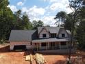 New construction home under wrap, large footprint at 300 Spanish Oak Ln, Gastonia, NC 28056