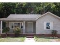 One story house with gray siding and white trim at 203 West Dr, Albemarle, NC 28001