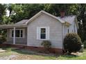 Gray siding one-story house with a covered porch at 203 West Dr, Albemarle, NC 28001