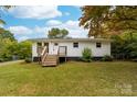 Charming white ranch home with a newly updated deck and landscaping at 115 E Georgia Ave, Bessemer City, NC 28016