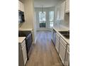 Kitchen with stainless steel appliances and breakfast nook at 258 Indian Paint Brush Dr, Mooresville, NC 28115