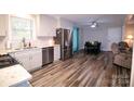 Modern kitchen with stainless steel appliances and light gray cabinets at 416 Witten Ln, Gastonia, NC 28052