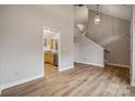 Spacious living room with hardwood floors and an open floor plan at 14131 Bernardy Ln, Charlotte, NC 28269