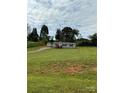 Mobile home on a spacious lot with shed at 280 Deerfield Estates Ln, Stony Point, NC 28678