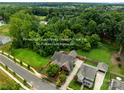 Aerial view showing home's private green space and location at 8244 Dumphries Dr, Huntersville, NC 28078