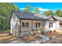 Newly built home with a front porch and walkway at 844 Cabaniss Dr, Shelby, NC 28150