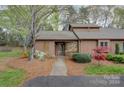 Single-story house with stone accents at 1720 12Th Ne St, Hickory, NC 28601