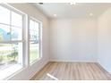 Spacious office with large windows and hardwood floors at 1813 Augustine St, Monroe, NC 28112