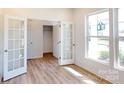 Bright home office with double french doors and hardwood floors at 1813 Augustine St, Monroe, NC 28112