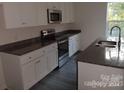 Modern kitchen featuring stainless steel appliances and granite countertops at 265 Prospect Trl, Salisbury, NC 28147
