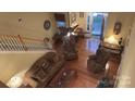 Spacious living room with hardwood floors and ample seating at 12111 Frogs Leap Ct, Charlotte, NC 28277