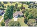 Aerial view of a house on a golf course at 118 Broadbill Dr, Mooresville, NC 28117