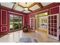 Bright office with hardwood floors, built-ins and French doors at 118 Broadbill Dr, Mooresville, NC 28117