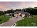 Luxury home with expansive grounds, pool, and sports court at 514 Billy Howey Rd, Waxhaw, NC 28173