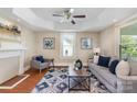 Bright living room featuring hardwood floors, a cozy seating area, and decorative artwork at 205 Martin Luther King Jr Ave, Salisbury, NC 28144